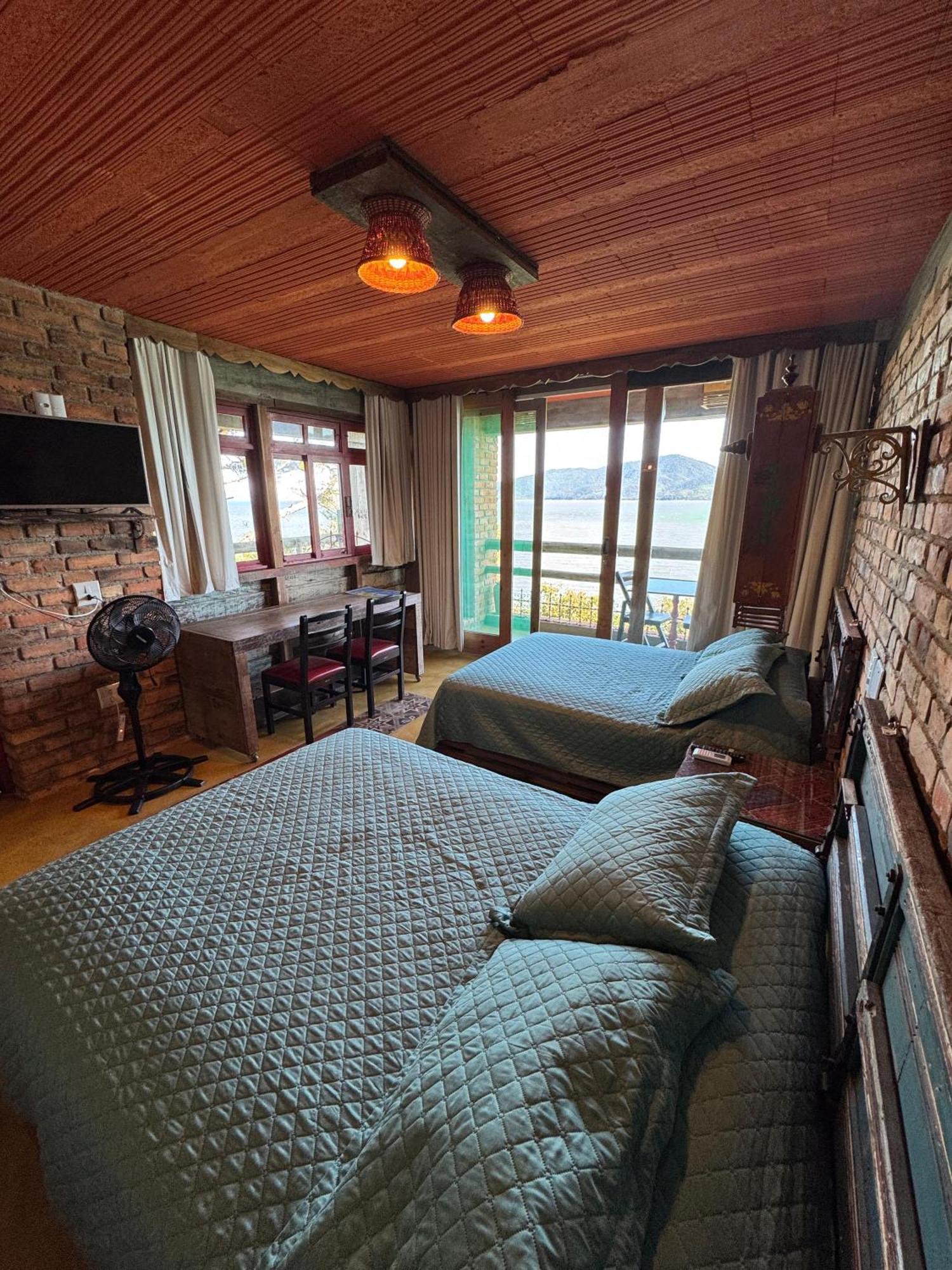 Quarto Duplo Deluxe com Varanda e Vista do Mar